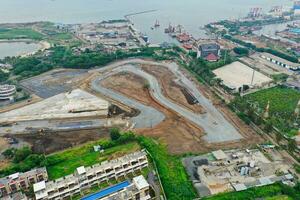 Aerial view of the Beautiful scenery of Jakarta Formula E Circuit. with Jakarta cityscape background. Jakarta, Indonesia, March 8, 2022 photo