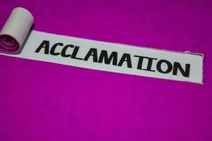 Acclamation text, Inspiration and positive vibes concept on purple torn paper photo