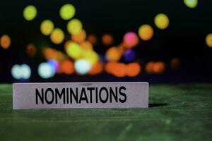 Nominations on the sticky notes with bokeh background photo