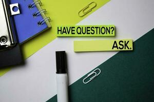 Have Question ASK. text on sticky notes with office desk concept photo