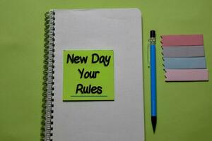 New Day Your Rules write on a sticky note isolated on office desk. photo
