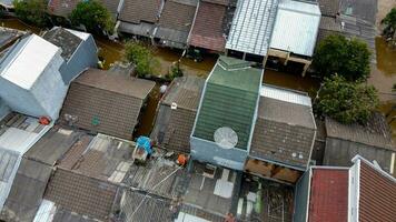 Aerial POV view Depiction of flooding. devastation wrought after massive natural disasters at Bekasi - Indonesia photo