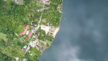 Aerial view of Danau Singkarak. Singkarak lake is one of the beautiful lake located in West Sumatera attracting thousands of tourists. Sumatra, Indonesia, January 25, 2023 photo