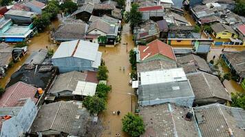 Aerial POV view Depiction of flooding. devastation wrought after massive natural disasters at Bekasi - Indonesia photo