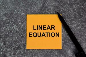 Linear Equation on top view isolated on office desk. photo