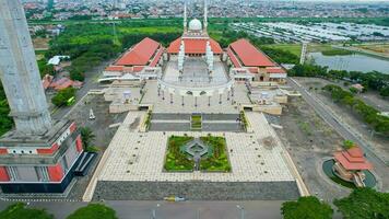 Aerial view of Great Mosque in Central Java. It is the largest mosque in Southeast Asia. Semarang - Indonesia. December 6, 2021 photo