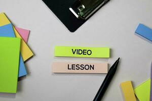 Video Lesson text on sticky notes with office desk concept photo