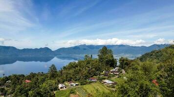 Aerial view of panorama of Maninjau Lake West Sumatra, Danau maninjau. sumatra, Indonesia, January 24, 2023 photo