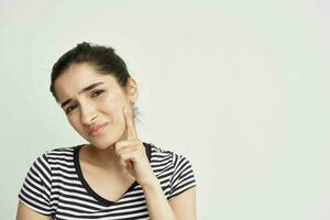 emotional woman holding on to face toothache health care isolated background photo