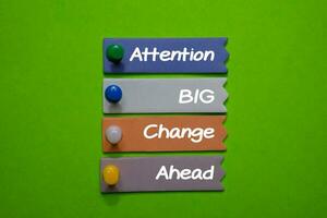 Attention Big Change Ahead write on sticky note isolated on Office Desk. photo