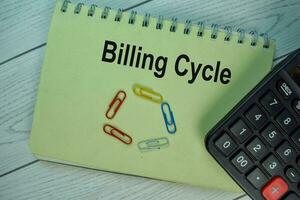 Billing Cycle write on a book isolated on office desk. photo