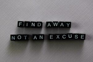 Find away not an excuse on wooden blocks. Motivation and inspiration concept photo