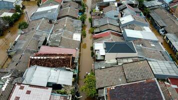 Aerial POV view Depiction of flooding. devastation wrought after massive natural disasters at Bekasi - Indonesia photo