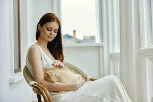 pretty woman hostess with her pet on the terrace outdoor recreation unaltered photo