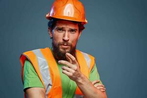 Cropped view of bearded man in working uniform construction engineer photo