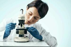 woman scientist biotechnology research microscope technology photo