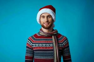 handsome man new year clothes christmas holiday blue background photo