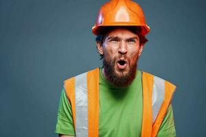 emotional worker orange hard hat construction cropped view photo