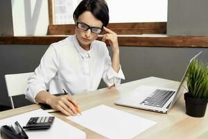 woman in costume in front of laptop Secretary executive Studio Lifestyle photo