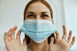 woman in medical mask protection from virus pandemic photo