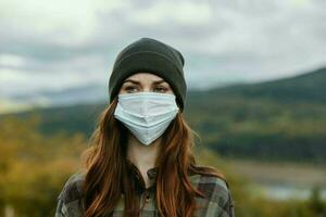 female portrait in the forest outdoors in the mountains photo