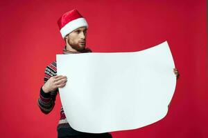 emotional man in New Year's clothes advertising copy space red background photo