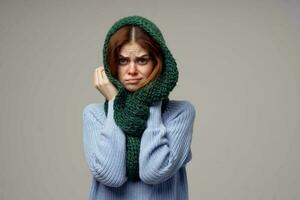 red-haired woman green scarf on the head close-up photo