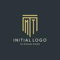 MT monogram with modern and luxury shield shape design style vector