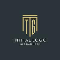 TG monogram with modern and luxury shield shape design style vector