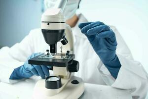 woman laboratory assistant microscope science technology professional research photo