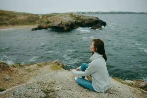 woman beach tourism cloudy weather stone coast Lifestyle photo