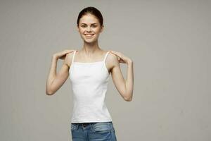 cheerful woman white t-shirts workout exercises photo