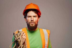 Worker man in orange paint construction security professional photo