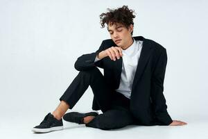 cute guy in suit curly hair blazer fashion self confidence photo