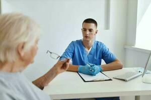 elderly woman at the doctor's appointment health care photo