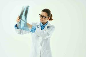 female doctor in white coat x-ray diagnostics treatment photo