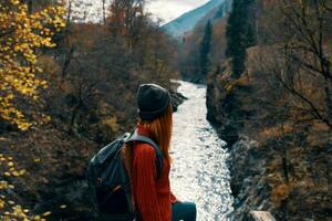 woman hiker river landscape travel laptop adventure photo