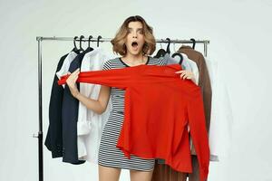 pretty woman clothes hanger shopping isolated background photo