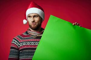 handsome man in New Year's clothes advertising copy space red background photo