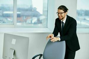 man in a suit documents in hand communication by phone technologies photo