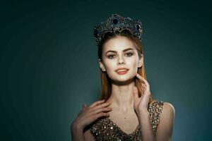 pretty woman with crown on her head princess glamor decoration model photo