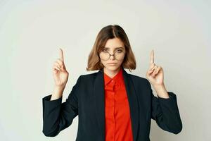 Business woman in suit gesturing with hands emotions work manager close-up photo