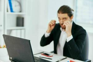 office worker work emotions in front of laptop technology photo