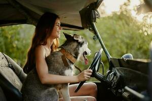 Woman and her husky dog happily traveling in car smile with teeth autumn walk with pet, travel with dog friend photo