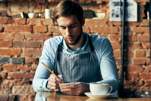 man aprons waiter professionals work service coffee shop photo