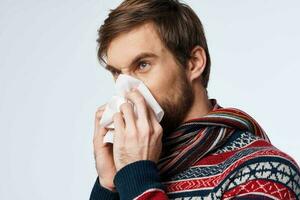 emotional man sweater health problems handkerchief flu infection isolated background photo