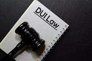 Dui Law text on Document and gavel isolated on office desk. Law concept photo