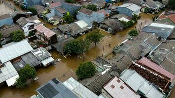 Aerial POV view Depiction of flooding. devastation wrought after massive natural disasters at Bekasi - Indonesia photo