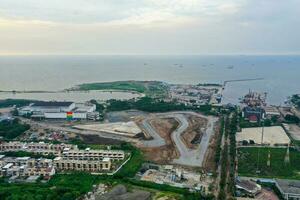 Aerial view of the Beautiful scenery of Jakarta Formula E Circuit. with Jakarta cityscape background. Jakarta, Indonesia, March 8, 2022 photo