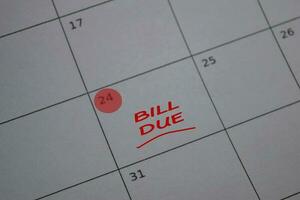 Bill Due write on calendar. Date 24. Reminder or Schedule Concepts photo